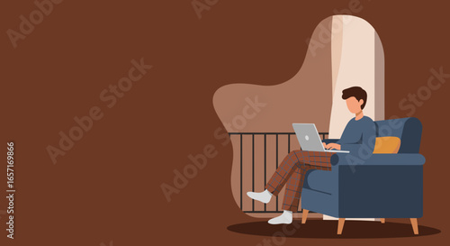 Young man comfortably working from home on his laptop in a relaxed setting. Ideal for remote work, freelance, and digital lifestyle concepts.