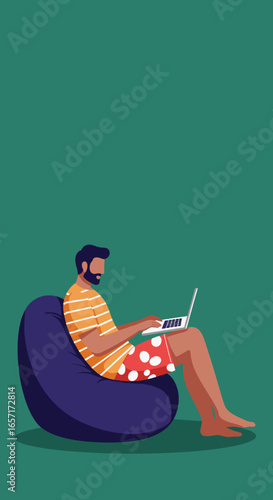 Man comfortably works remotely on laptop from a beanbag chair, embodying modern flexible work and digital lifestyle. Ideal for business or leisure concepts.