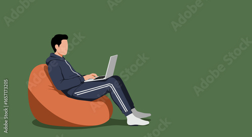 Person in casual wear comfortably working on a laptop from a beanbag chair. Ideal for concepts of remote work, online learning, or digital lifestyle.