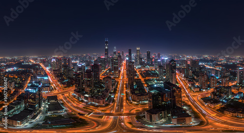 Modern City Skyline at Night with Bright Lights and Busy Highways