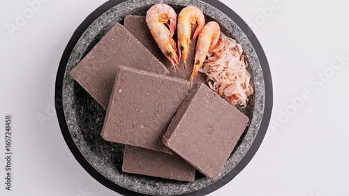 Traditional Indonesian Shrimp Paste Terasi on mortar stone