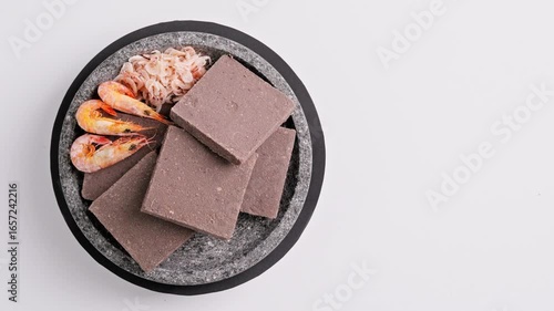 Traditional Indonesian Shrimp Paste Terasi on mortar stone