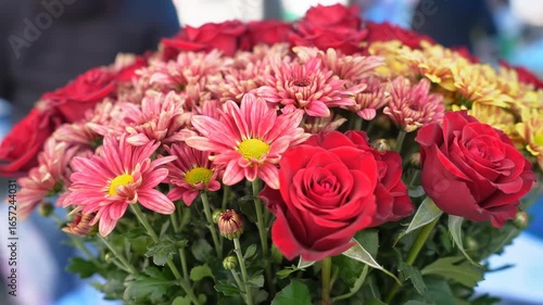 Vibrant bouquet of red and pink flowers