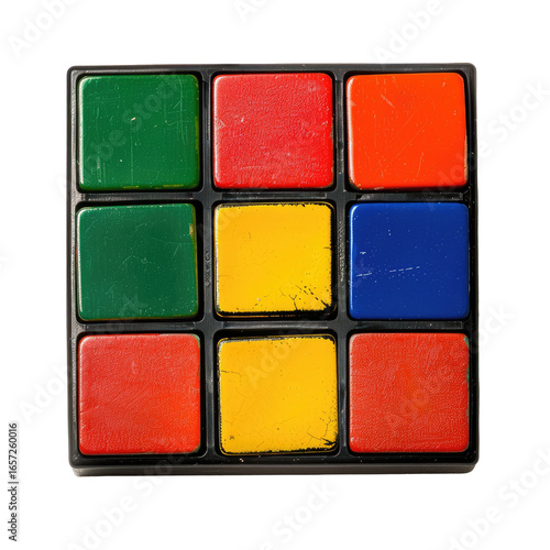 Close-up of a solved 3x3 colored puzzle showing worn squares
