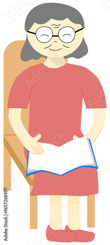 A senior woman happily reading a book