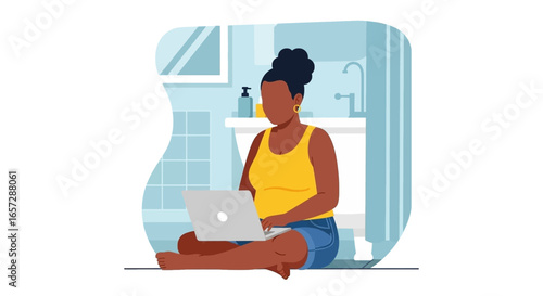 Woman sits comfortably on the bathroom floor using a laptop, representing remote work, digital living, or flexible working arrangements at home.