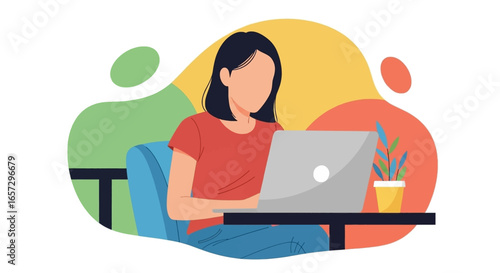 Young woman focused on her laptop, working remotely or studying online. Ideal for themes of productivity, freelance work, and digital lifestyle.