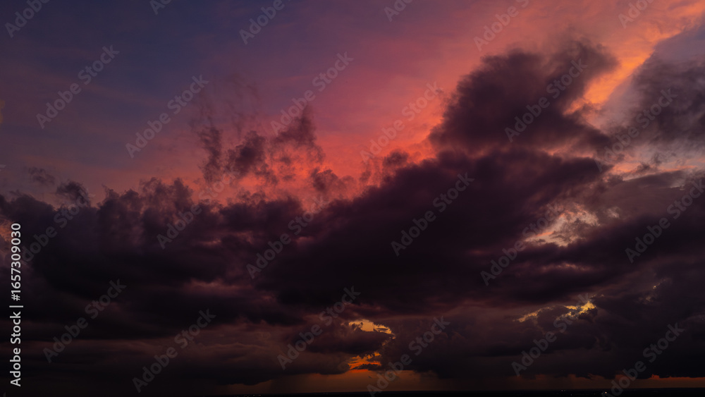 Fototapeta premium colorful dramatic sky with purple red golden cloud at sunset blue sky