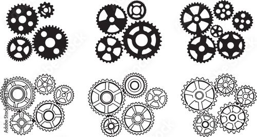 Collection of intricate black and white gears and cogs arranged in three distinct clusters