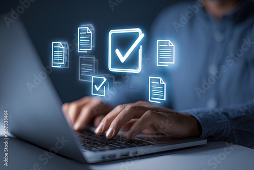 Person reviewing digital documents on laptop