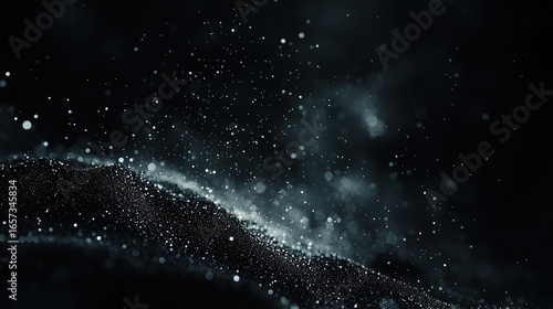 A dark black background with particles or elements randomly drifting in space. 