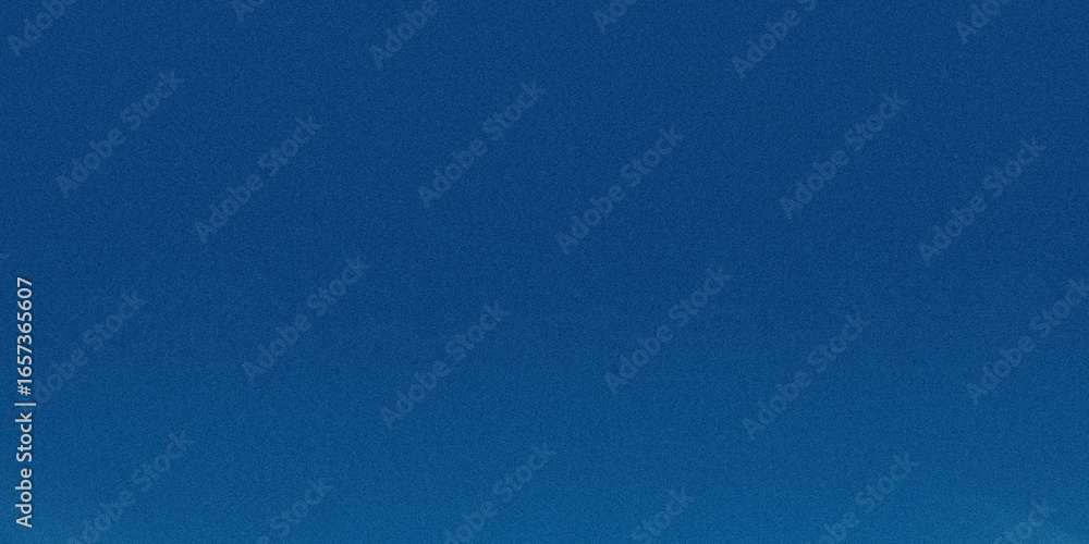 Naklejka premium A deep blue gradient background with a subtle grainy texture creates a calming and abstract visual effect