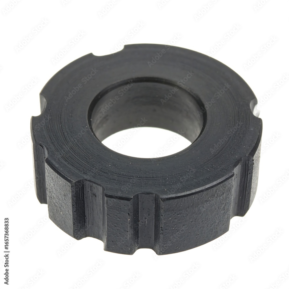 Obraz premium Dark grey, cylindrical part with concentric grooves and a central hole