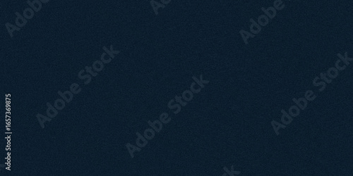 A grainy abstract texture features a soft gradient of dark navy, creating a blurred and smooth background effect