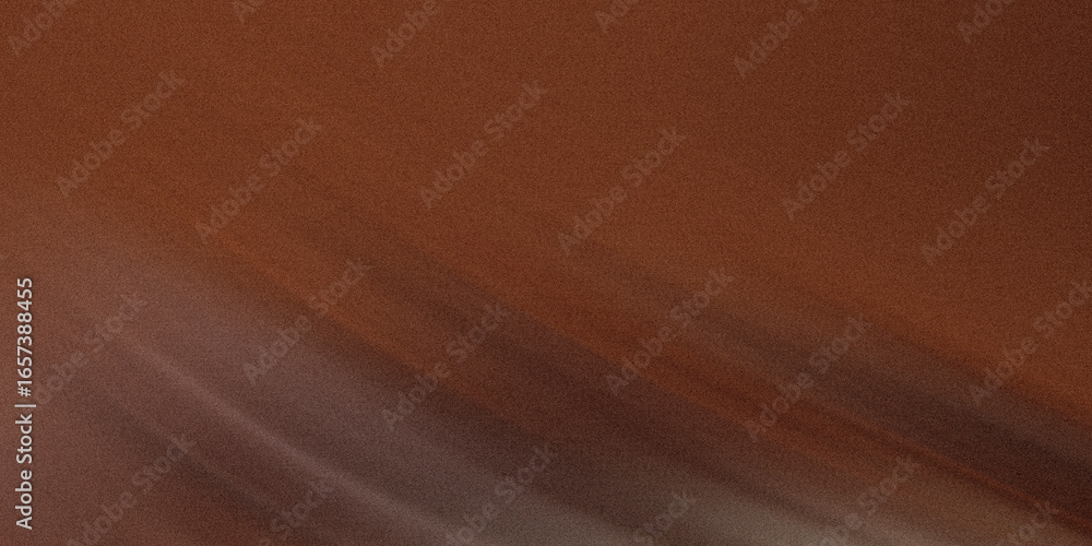 Obraz premium A textured brown background features subtle light patterns creating a warm and rustic abstract design