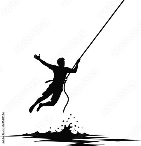 Silhouette of a bungee jumper leaping towards water, capturing thrill and excitement of extreme adventure sports