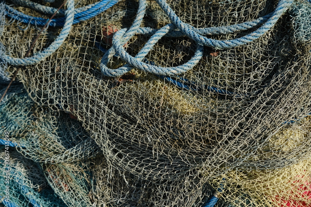 Close-Up Background of Fishing Nets and Various Ropes Close-Up Background of Fishing Nets and Various Ropes