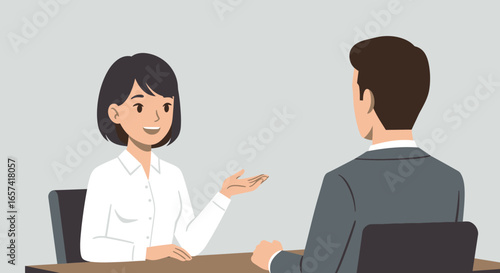 Smiling Woman in White Shirt Interviewing a Man.
