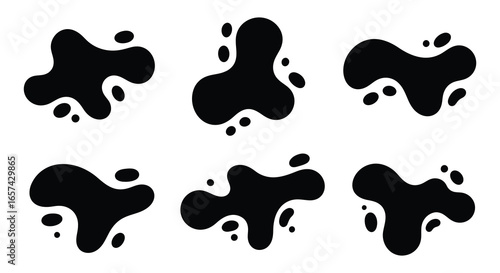 Black ink splatters on white background in various shapes and sizes silhouette