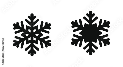 Two black snowflakes on a white background winter weather icons silhouette