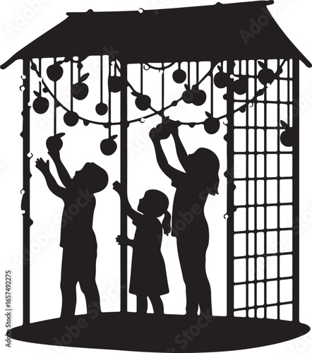 Children picking fruit from a decorative structure