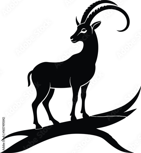 Black silhouette of an ibex standing on a tree branch against white goat animal