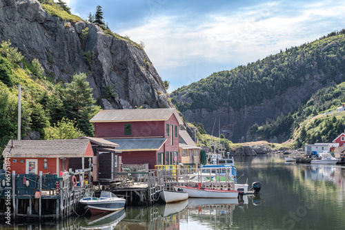 Fishing stages and boats in the Quidi Vidi harbour of St. John’s Newfoundland