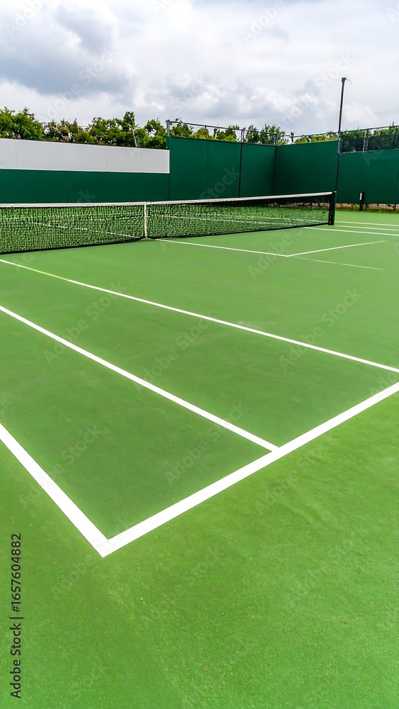 Fototapeta premium Tennis court, green surface, white lines