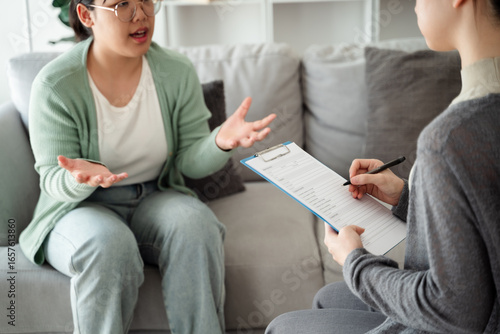 Psychologist doctor examine and listen and talking to patient with depression, mental health concept