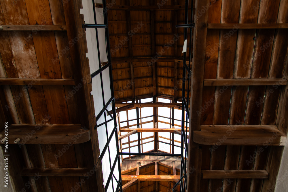 Obraz premium low angle view of the wooden structure at the museum building