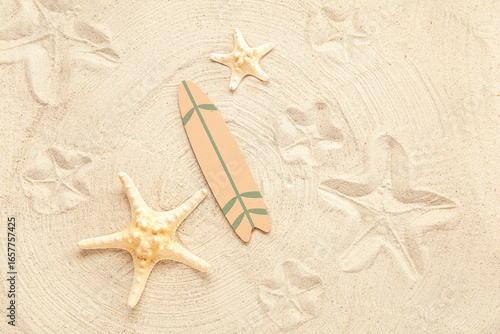 Mini surfboard with starfis...