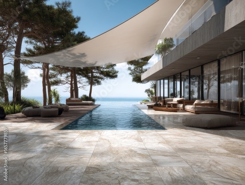 A large house with a pool and a large white umbrella. There are several potted plants around the pool area