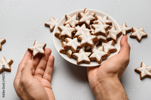 Male hands with plate of st...