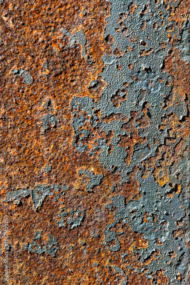 Peeling paint on an old railway carriage with rust Peeling paint on an old railway carriage with rust