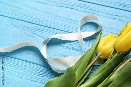 Yellow tulips and white rib...