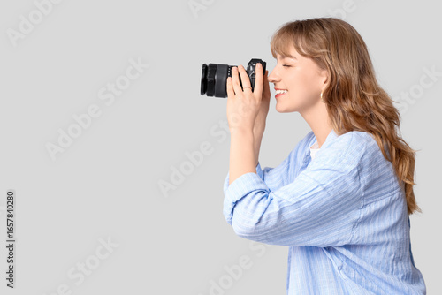 Beautiful young woman takin...