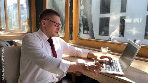 office employee typing on computer working on project