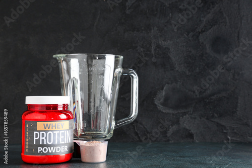 Bottle of protein powder an...