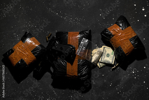 Drug packages with gun, bul...