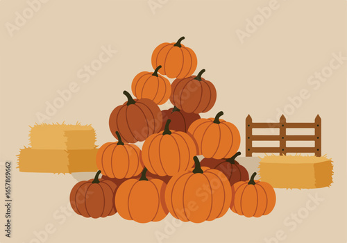 Stacked pumpkins by hay bales near a fence for fall festivals, events