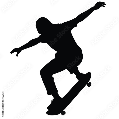Skateboarder performing aerial trick silhouette skateboarding