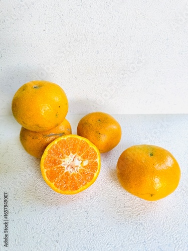 Close-Up of Stacked and Sliced Tangerines 
