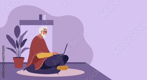Mature man working remotely on a laptop at home, sitting comfortably. Represents modern retirement, digital literacy, and flexible work lifestyle.