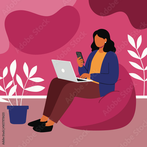 Woman comfortably using laptop and smartphone on a bean bag. Ideal for remote work, digital communication, and relaxed home lifestyle concepts.