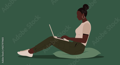African American woman working remotely on laptop from home, embodying productivity, comfort, and modern lifestyle. Ideal for remote work, education, or digital concepts.