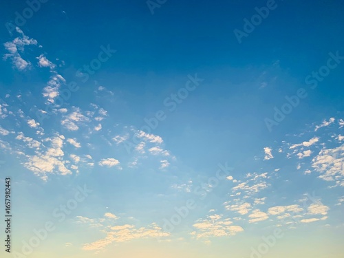 sun and clouds horizon and sky blue and white nature and color background and illumination 