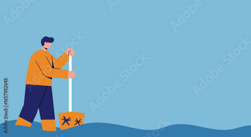Person in an orange shirt and boots using a shovel in water. Represents concepts of effort, problem-solving, winter work, or flood clean-up.