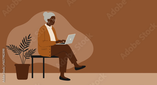 An elegant senior Black woman focused on her laptop, embodying modern senior living, online learning, and remote work. Ideal for technology, lifestyle, or business themes.