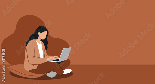 Woman working comfortably on a laptop at home. Ideal for remote work, online learning, freelance concepts, and digital lifestyle.