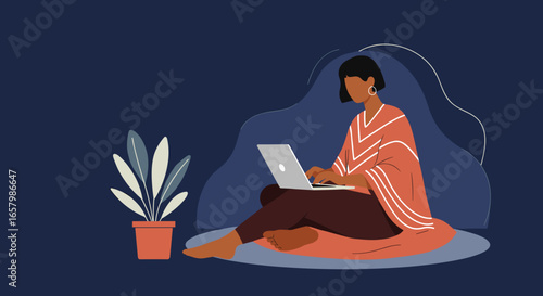 Focused woman working remotely on laptop at home, embracing digital lifestyle and flexible productivity in a comfortable setting.